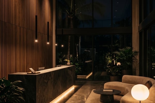 Interior night render: travertine living room lit by warm lamps